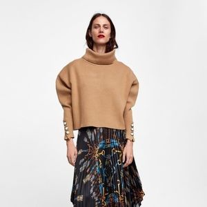 sweater with pearl bead cuffs